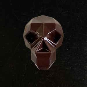 Halloween luxury treat : dark chocolate with praline filling mini skull