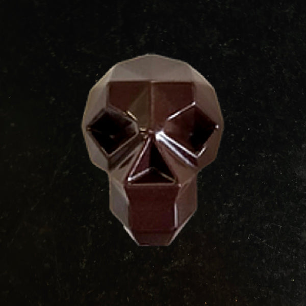 Halloween luxury treat : dark chocolate with praline filling mini skull